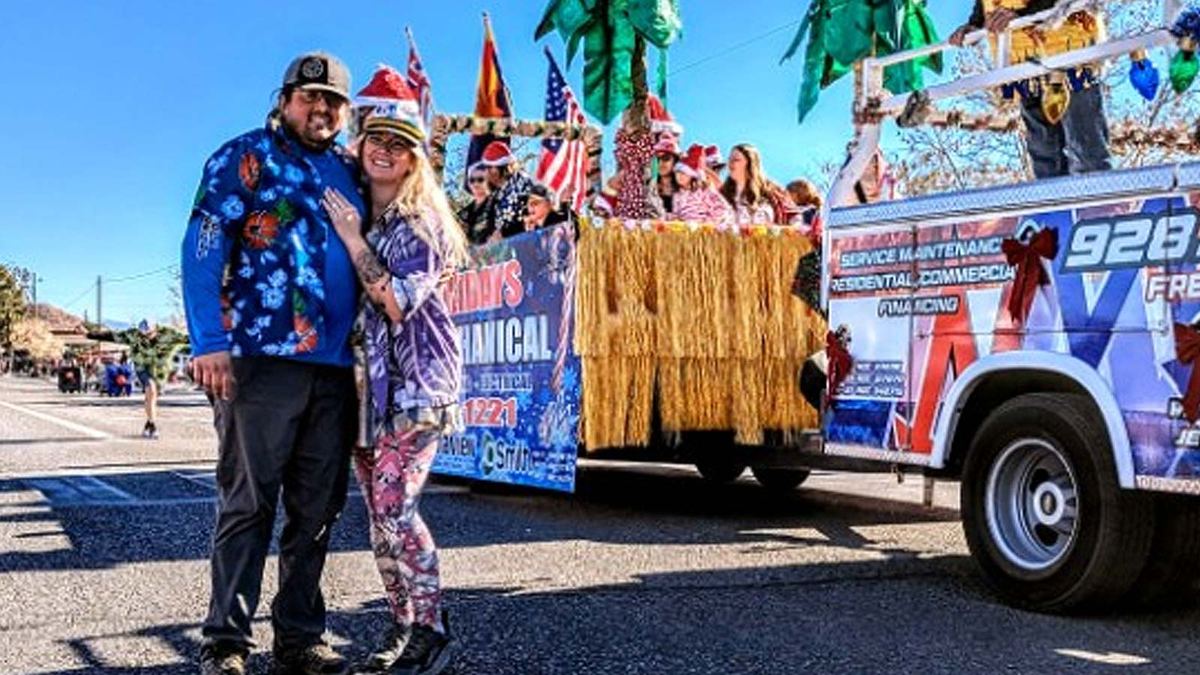Nichols team members with the company float at the Cottonwood parade