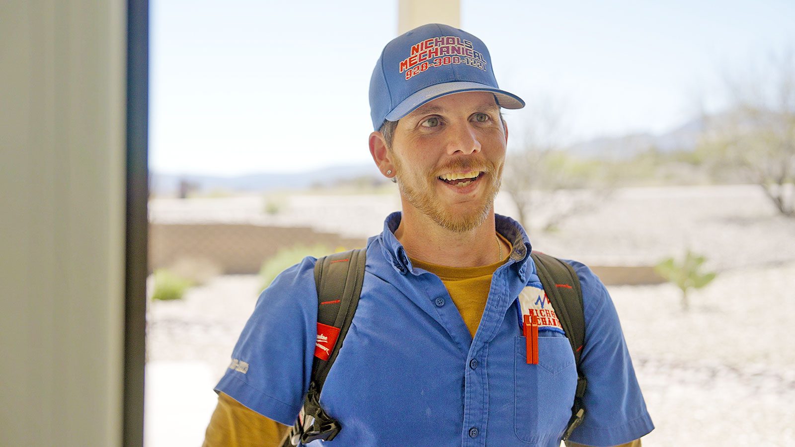 Smiling Nichols technician