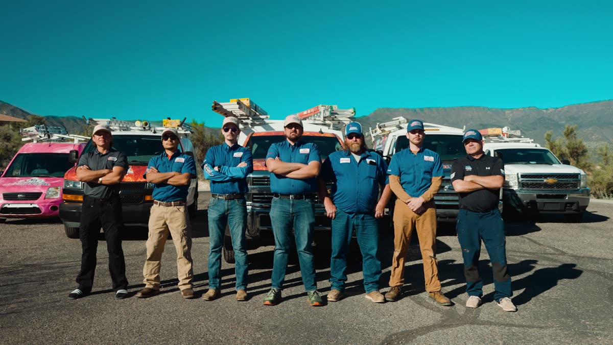 The Nichols team lined up in front of their trucks